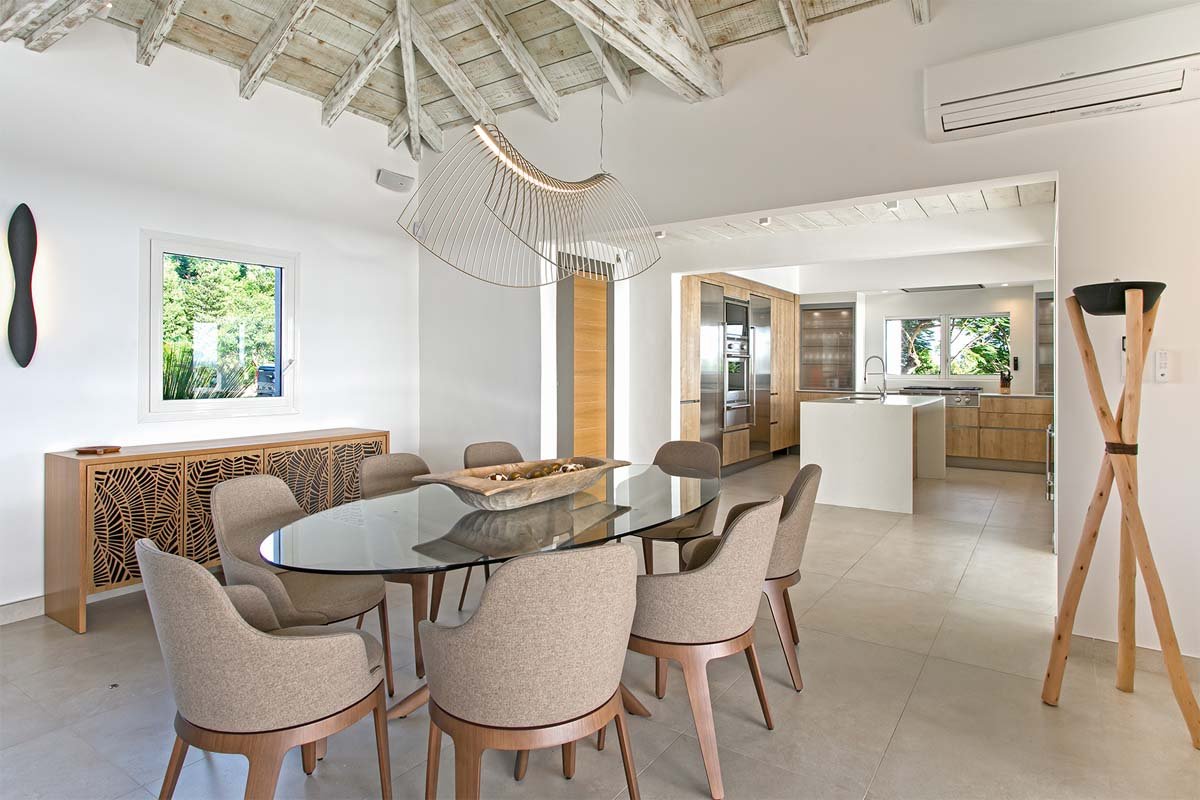 Modern kitchen with Wolf and Sub-Zero appliances, island, and breakfast bar at Villa Avanti, St. Martin.