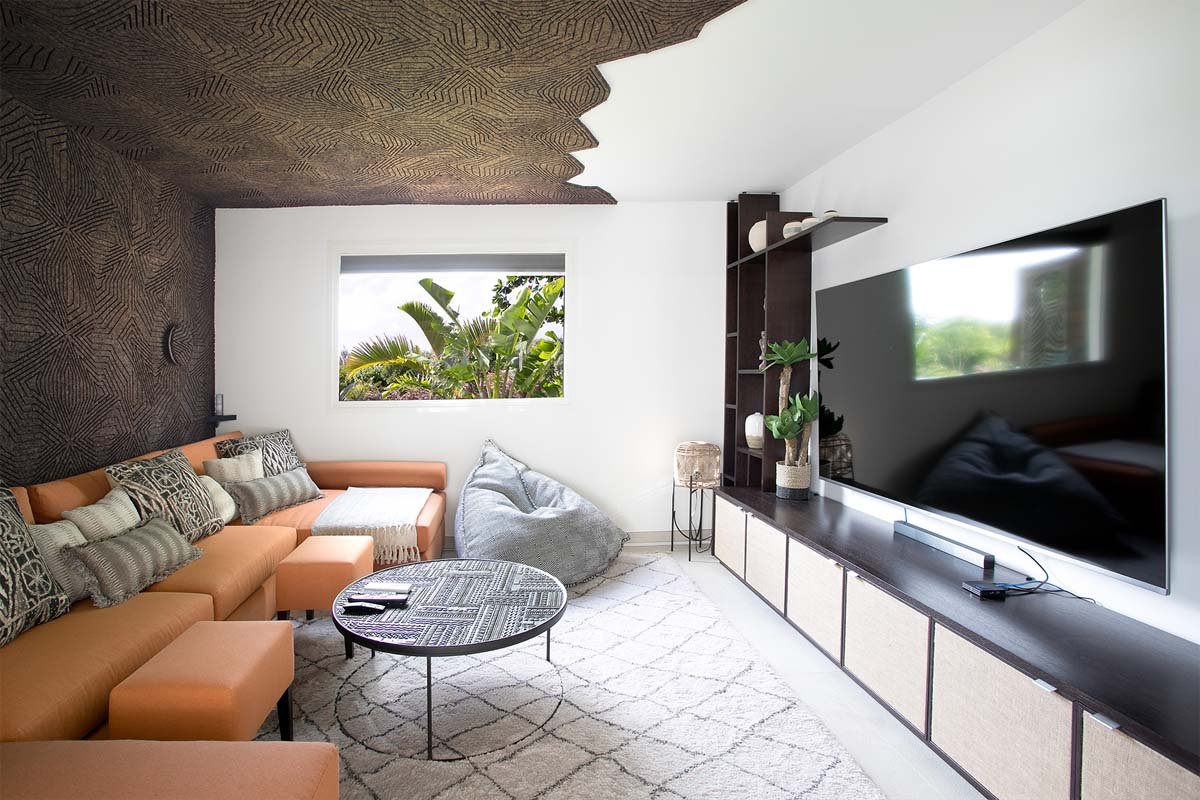 Cork-lined media room with 82” Smart TV and Bose surround sound at Villa Avanti, St. Martin