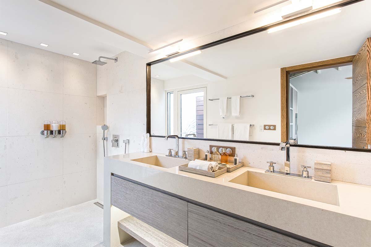 Villa Avanti St. Martin modern bathroom with double vanity and rain shower.