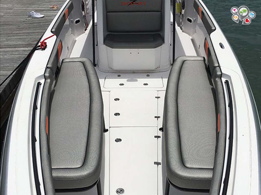 Spacious interior of Donzi ZF Impulse 38FT powerboat, featuring plush seating and sleek design