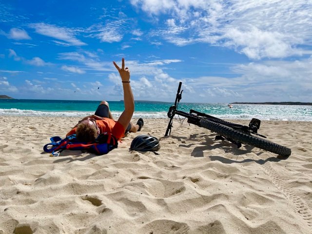 Mountain biking around St. Martin with scenic coastal views.