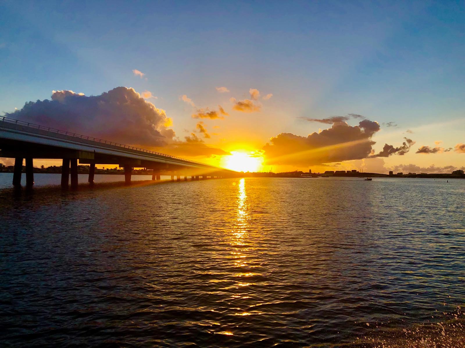 “Cross the Iconic Causeway Bridge and Explore the Best of St. Martin and St. Maarten” Causeway Bridge between Simpson Bay and Cole Bay - Overlooking the Airport of Sint Maarten and Sunsets