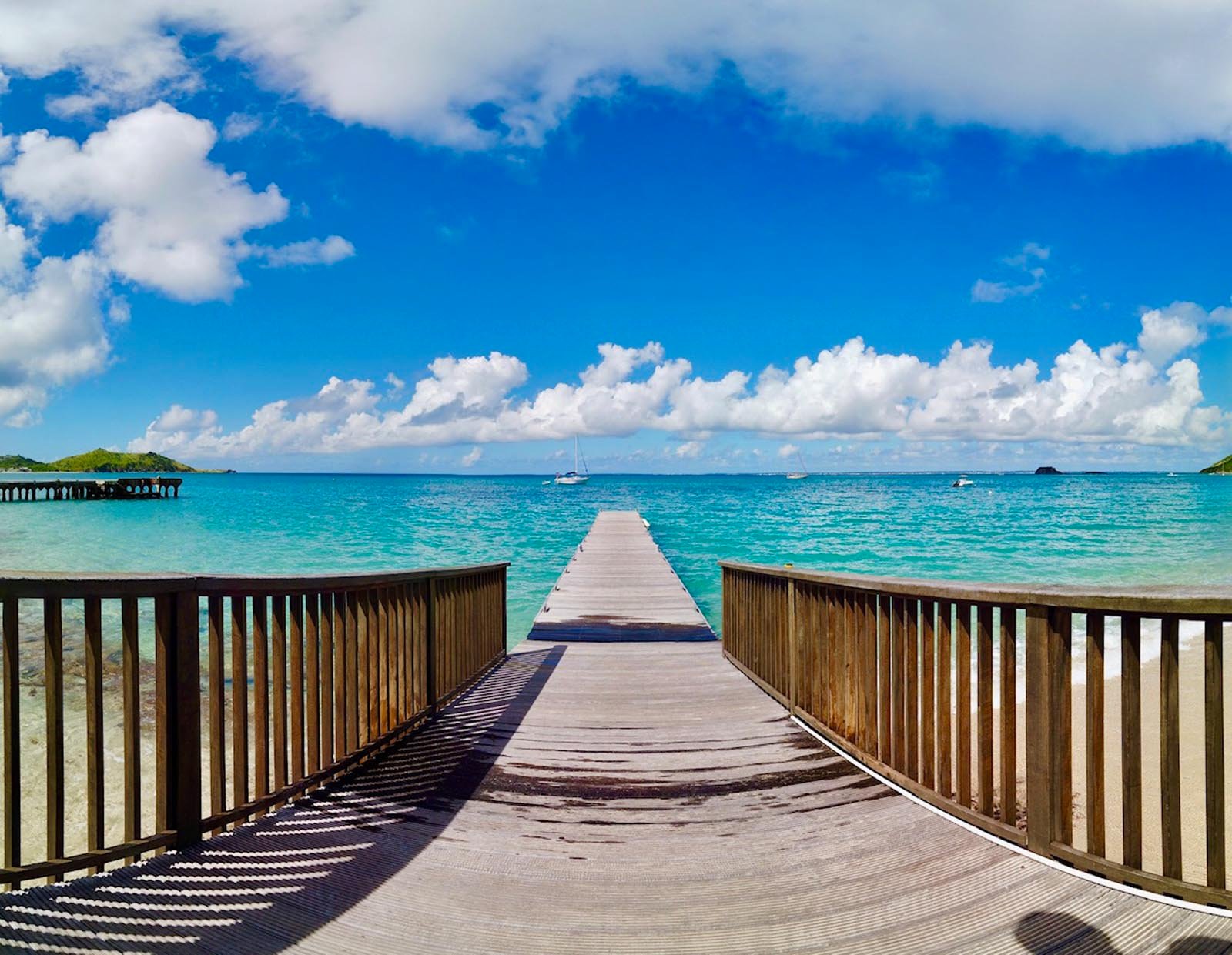 Grand Case Beach – Wooden Dock Grand Case Beach - Wooden Dock - White sandy beach, Rainbow Cafe, Le Temps, Captain Frenchy
