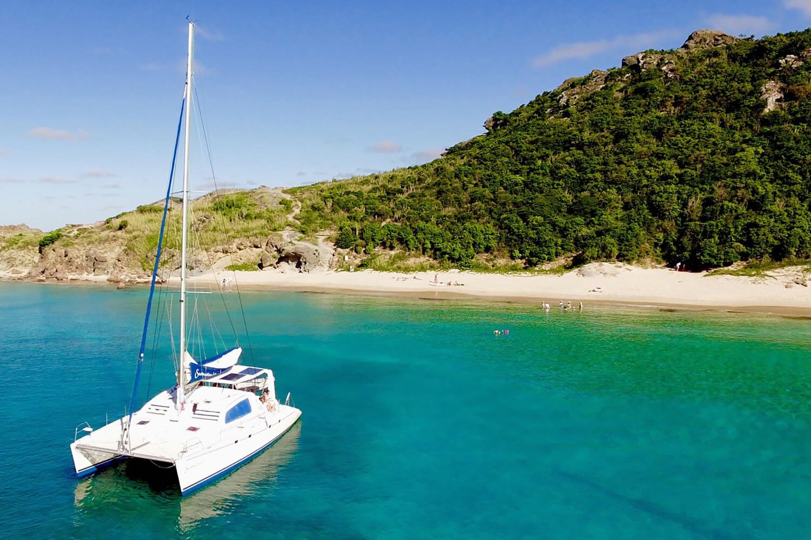 Seaduction L47 catamaran anchored near beach, turquoise waters, St. Martin
