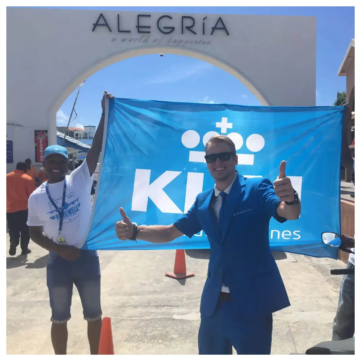 KLM's final Boeing 747 landing at St. Maarten's Princess Juliana International Airport, captured over Maho Beach with the aircraft flying just above the sand.