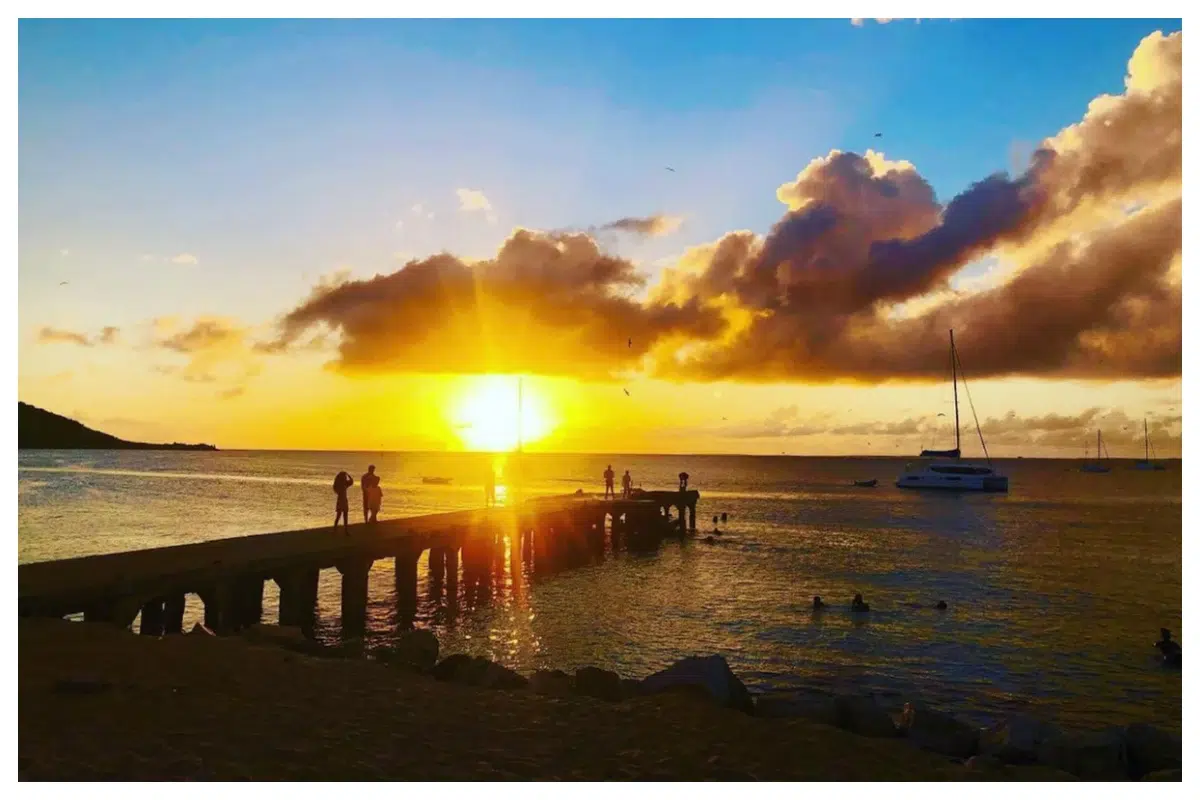 Sunset in Grand Case, Stunning view Sunset over Grand Case Beach, Sint Maarten—vibrant sky and tranquil Caribbean waters