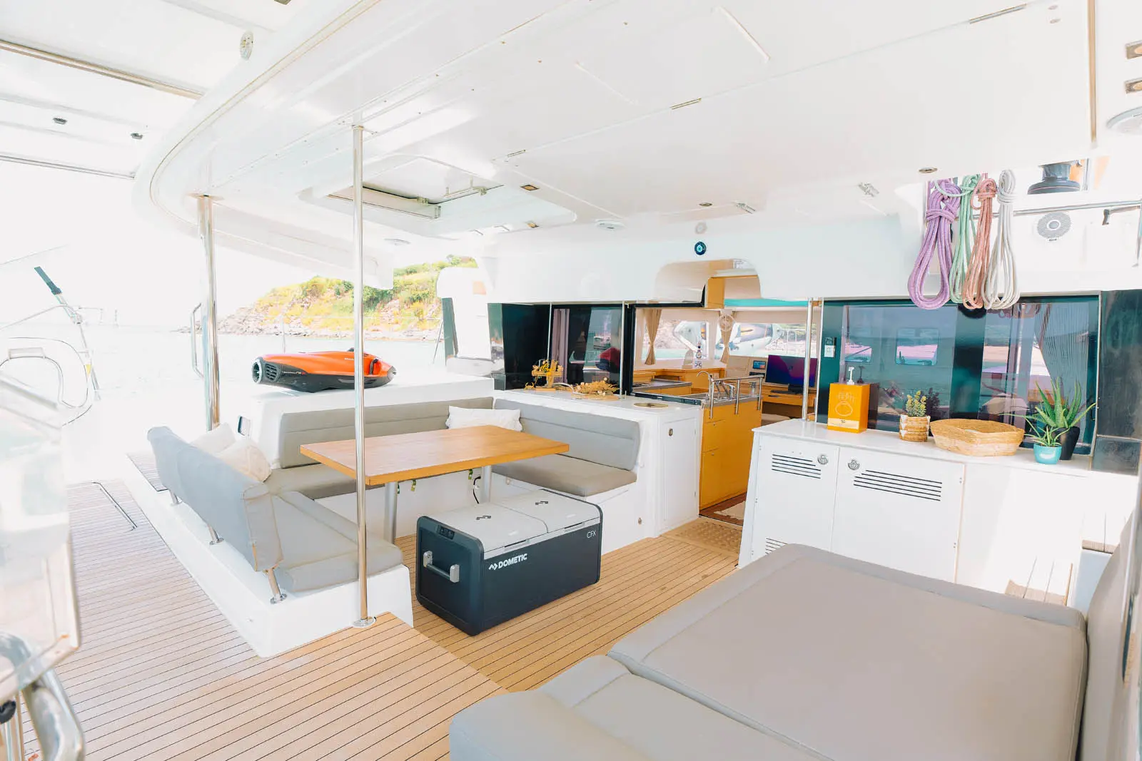 Amari sailing catamaran cruising in turquoise St. Maarten waters