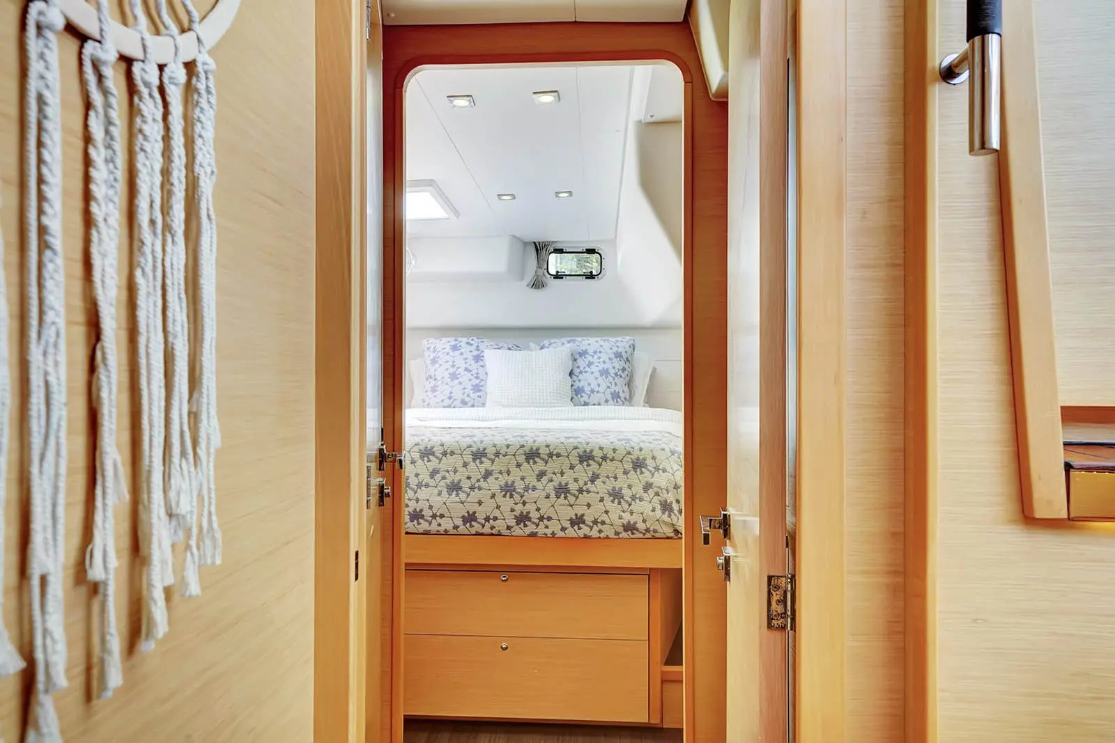 Amari Lagoon 450F spacious ensuite cabin with soft lighting aboard St. Maarten charter